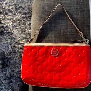 Bright red coach purse